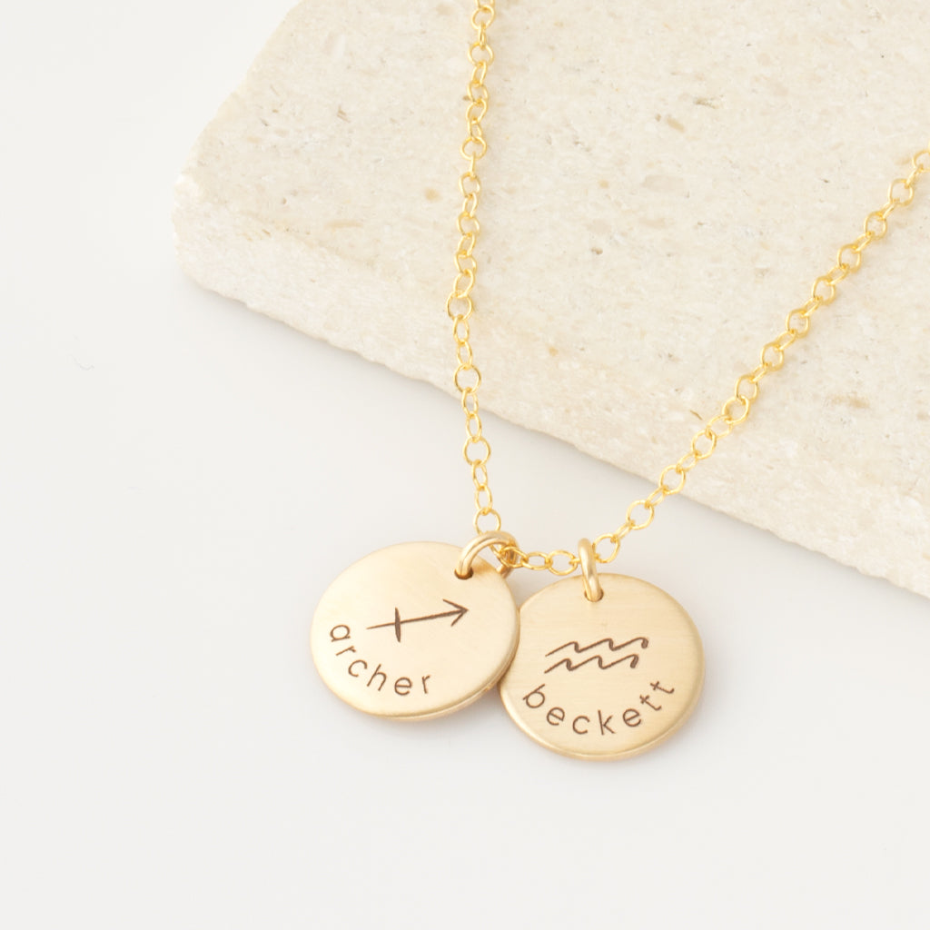 Minimalist zodiac name necklace layered with chains